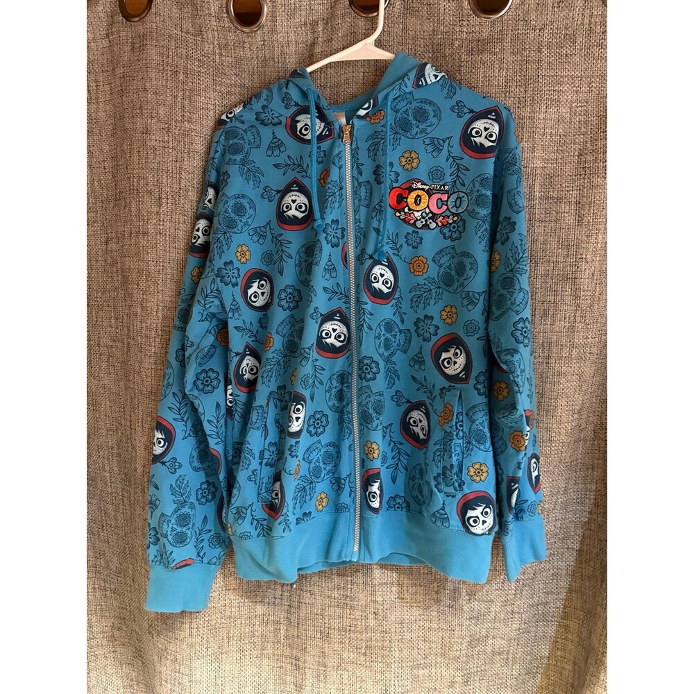Disney Pixar Coco full-zip hoodie featuring an all-over skeletal motif